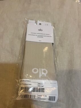 ALO Yoga Unisex Throwback Sock in Bone with White Logo